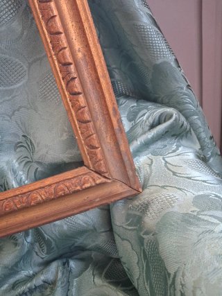 Cornice in legno dorato