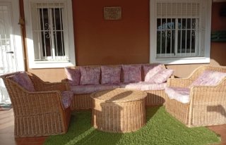 Conjunto de jardín de mimbre y tela