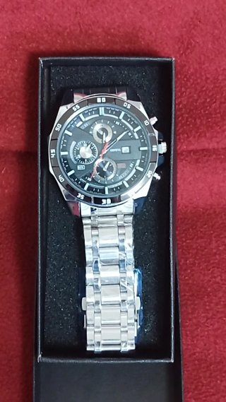 Reloj de pulsera plateado y negro para hombre