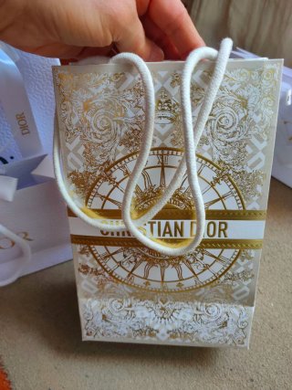 Bolsas de regalo Dior blancas y doradas