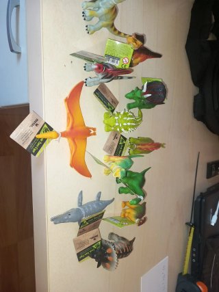 2 lotes de figuras de dinosaurios