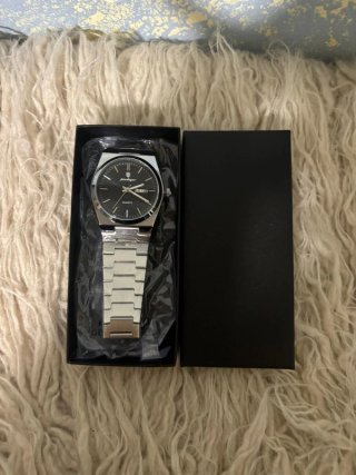 Reloj Podegard Negro con Correa Plateada