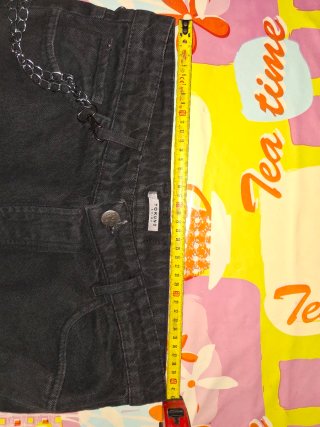Jeans neri strappati estivi