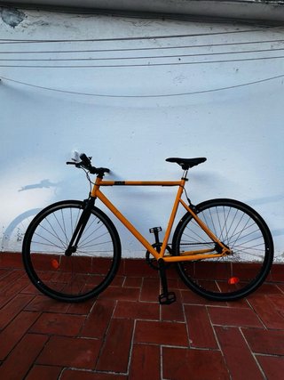 Bicicleta Fixie amarilla  Decathlon