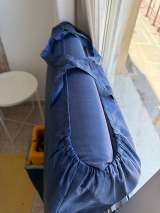 Cuna de viaje plegable.