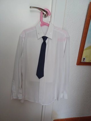 Traje Comunión Niño azul oscuro y pantalon crema