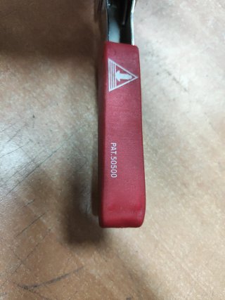 Pinza para tacos metálicos