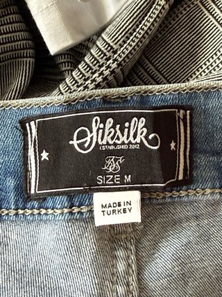 Pantalón vaquero desgarrado slim fit azul