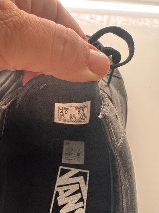 Zapatillas Vans niño negras.