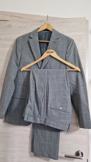 Traje