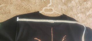 Vestido negro con pedrería de gato