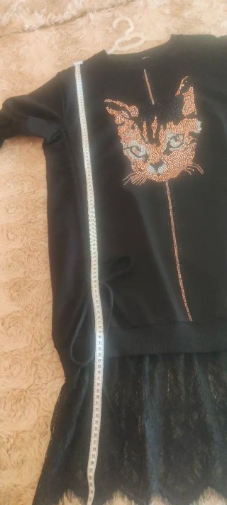 Vestido negro con pedrería de gato