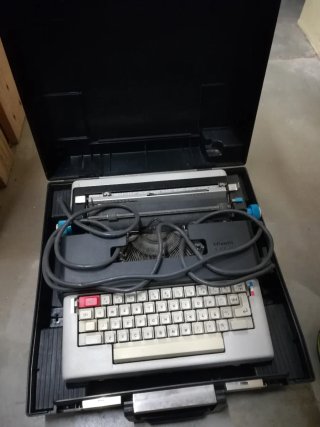 Máquina de escribir eléctrica portátil