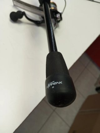 Caña de pescar con carrete