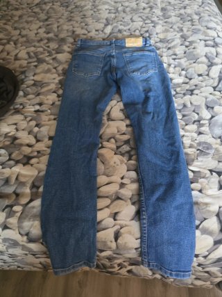 Pantalón vaquero desgastado azul
