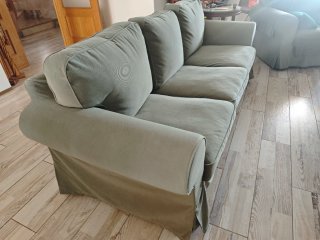 Sofá verde de tela Es totalmente desenfundable