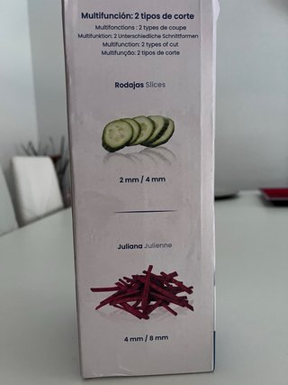Mandolina de cocina azul y blanca