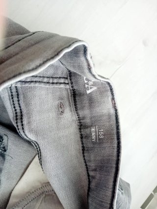 Pantalón vaquero largo niña gris