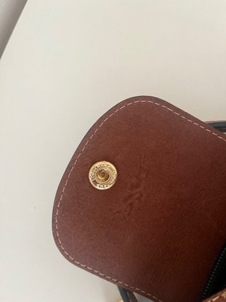 Mala mini Longchamp preta e castanha