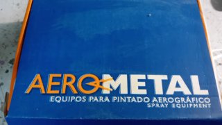 Pistola aerográfica azul sin usar