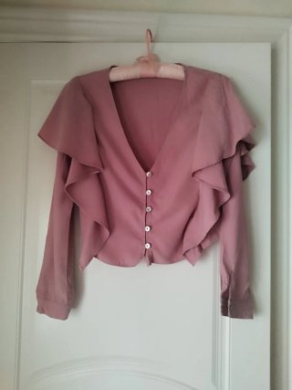 Blusa rosa con volantes