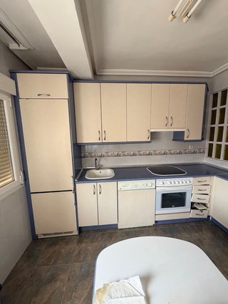 Muebles de cocina beige y azul En melamina