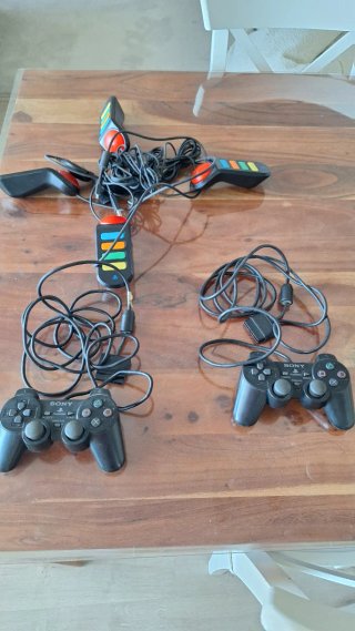 Pack PS2 + 9 juegos y accesorios