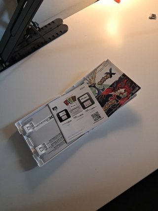 Pokémon X con cartucho, manuales y caja original