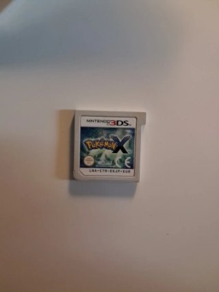 Pokémon X con cartucho, manuales y caja original