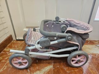 Cochecito de muñecas gris y rosa