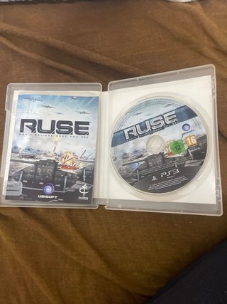 2 juegos FIFA 14  y RUSE  ps3