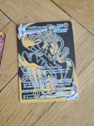 Cartas Pokémon VMAX y Entrenador