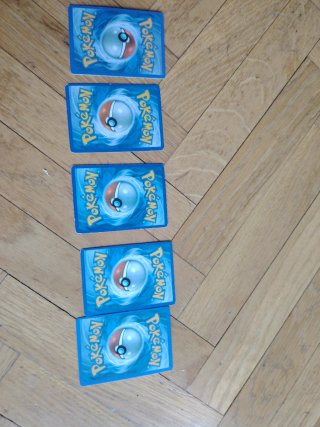 Cartas Pokémon VMAX y Entrenador