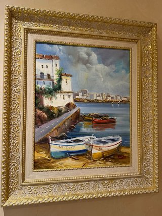 Cuadro pintado al óleo con marco dorado