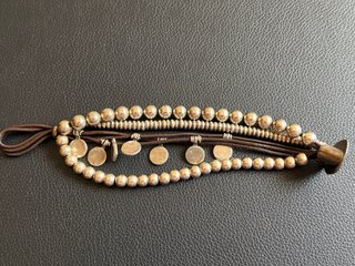 Pulsera UNO de 50 Cuero y plata.