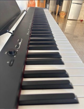 Teclado eléctrico (piano) Casio con banqueta