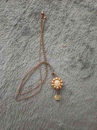 Collana con ciondolo sole e perla