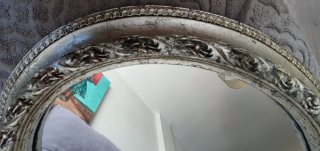 Espejo ovalado con marco decorado artesanía.Nuevo.