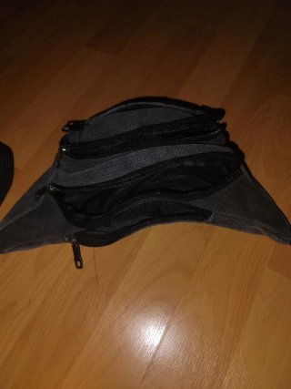 Riñonera deportiva lona gris