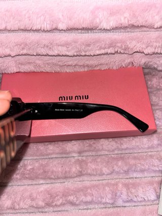 Gafas de sol Miu Miu negras