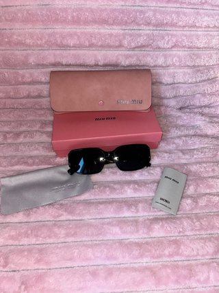 Gafas de sol Miu Miu negras