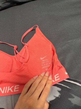 Top deportivo Nike salmón