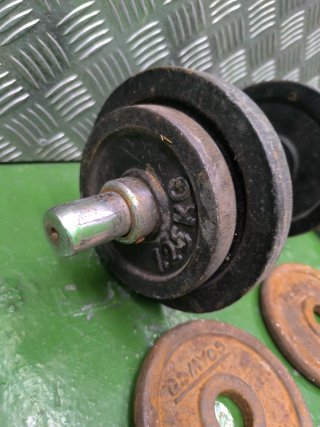 Pesas y barras de gimnasio