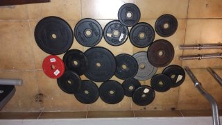 Lote discos pesas y 3 barras