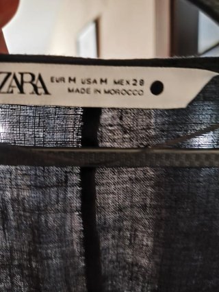 Vestido de lino negro de flecos de seda y nudo