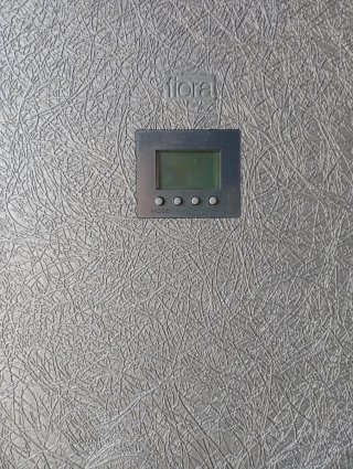 Calefactor de diseño para baño plateado