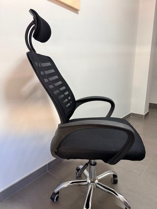 Sillón de oficina ergonómico con ruedas