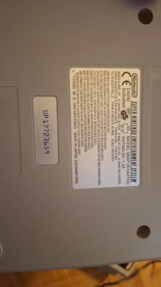 Super Nintendo Entertainment System y juego mario