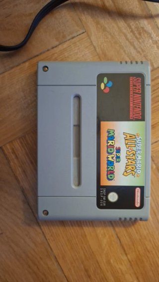 Super Nintendo Entertainment System y juego mario
