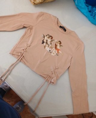 Camisa rosa crop top con cordones